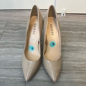 Elegant tan high heel by Guess, size 8.5